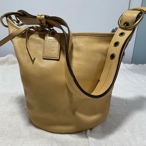 Coach “Bleeker” Yellow Leather Bucket Bag.